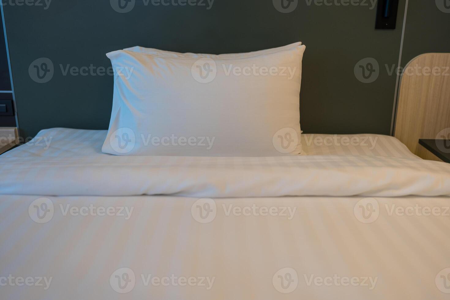 Close up of pillows in a bed photo
