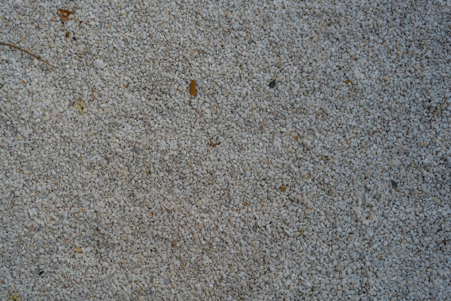 White pebbles. View from above. Natural stone background. Copy space photo