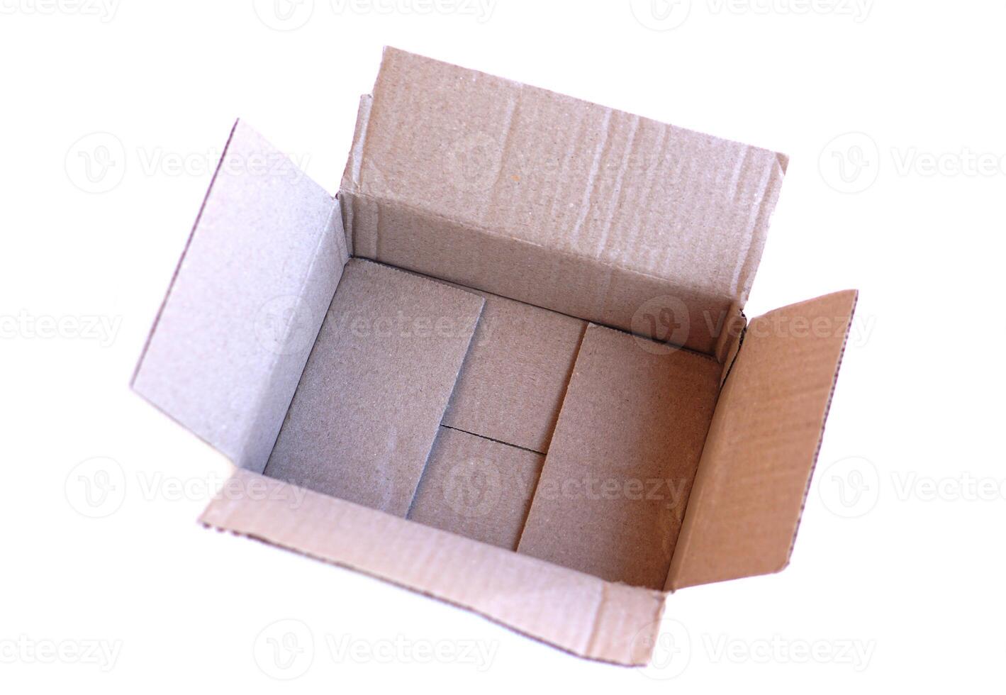 Empty opened cardboard box isolated on white background. Concept, packaging , parcel box. Variety purpose usages for delivery business or industry factory. photo