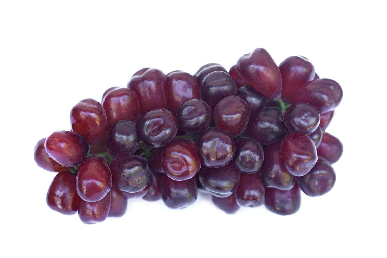 Bunch of fresh seedless red grapes, fruits , white background. Concept, Healthy eating. Agricultural crops. photo