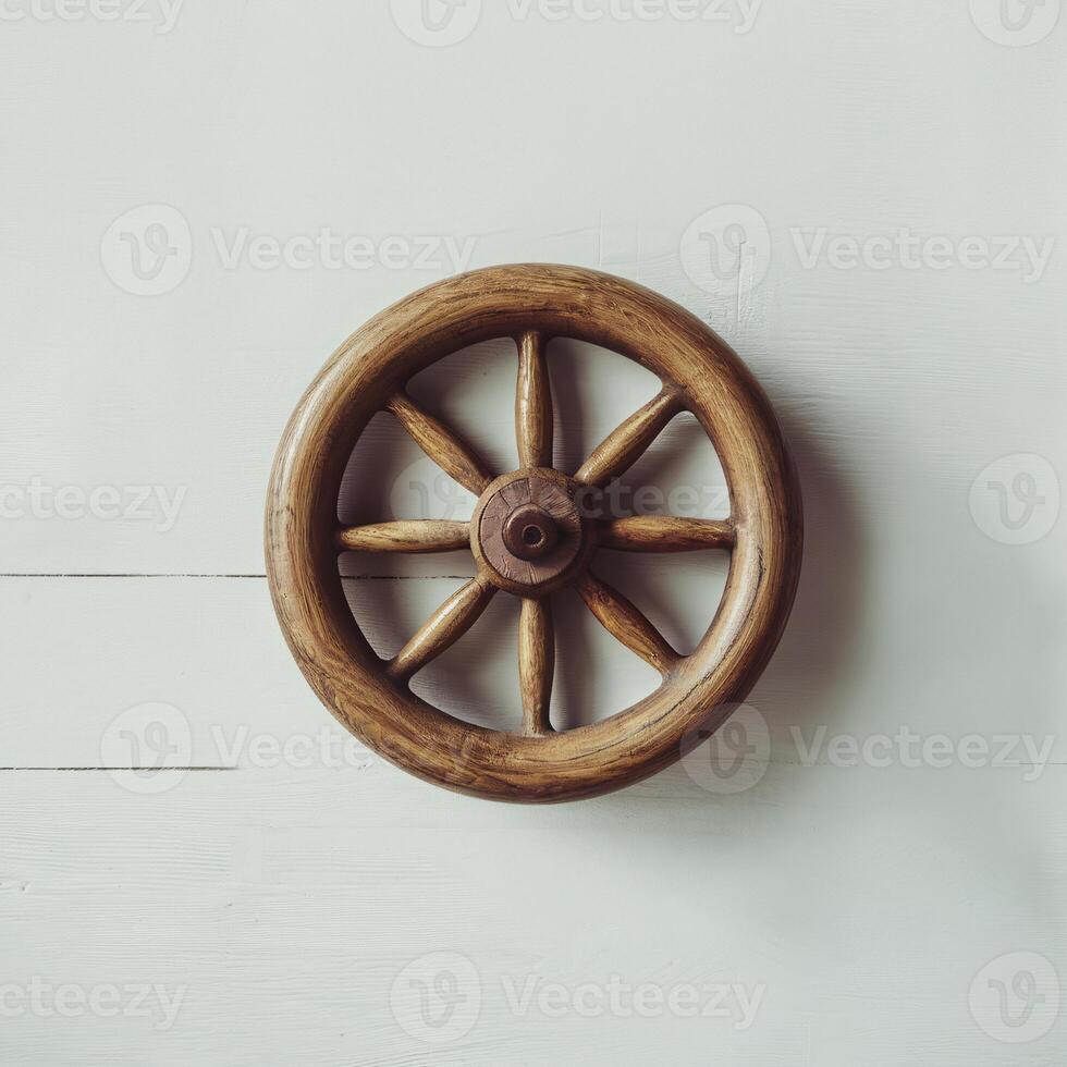 A rustic wooden wheel, showcasing intricate craftsmanship and a vintage aesthetic. photo