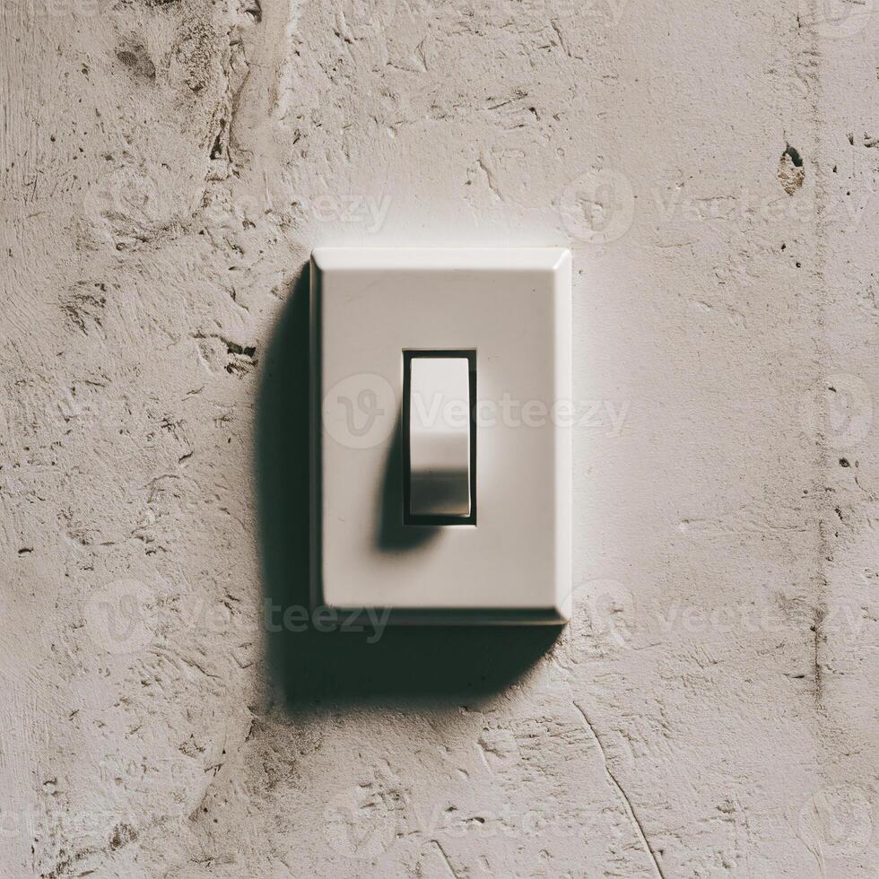 Minimalistic light switch on a textured wall, creating a serene atmosphere. photo