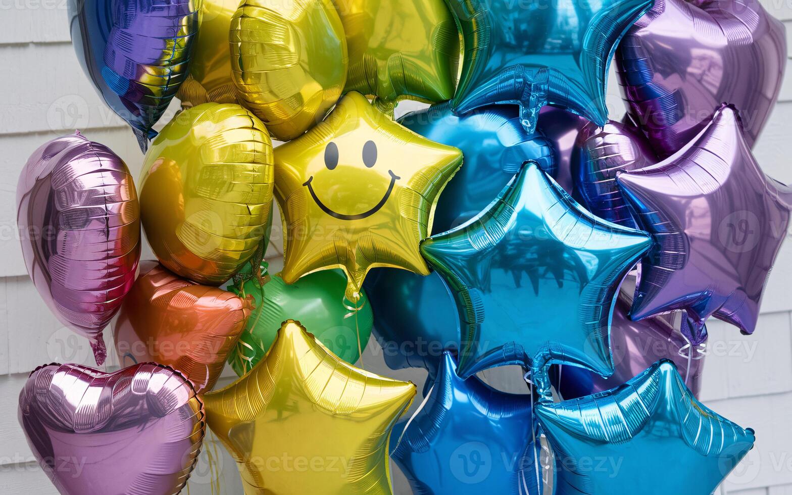 Colorful balloons including stars and smiley faces create a festive atmosphere. photo