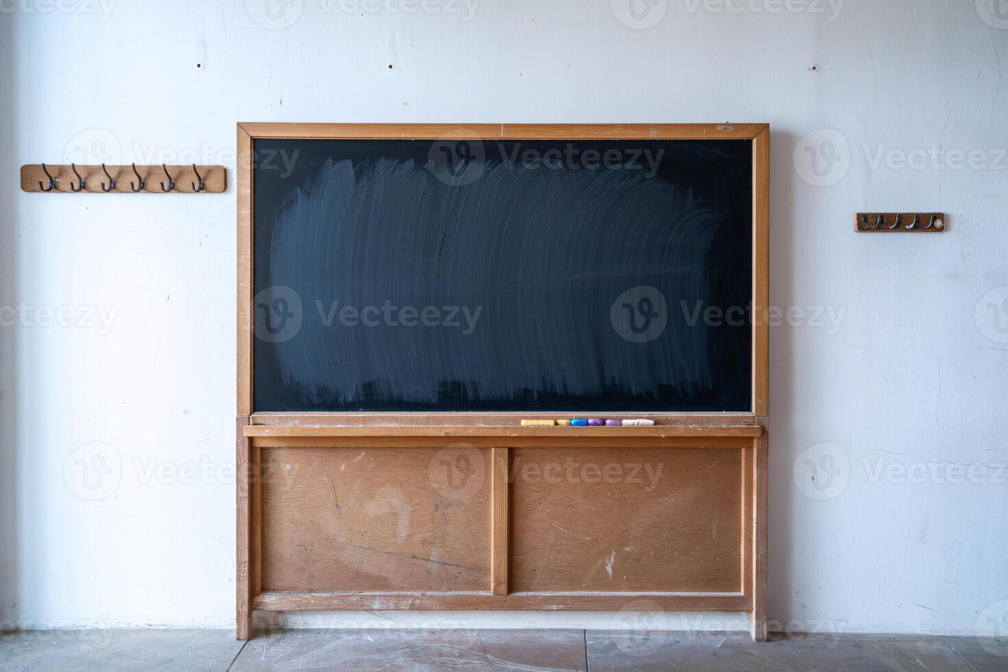 Empty blackboard in a light classroom setting, inviting creativity and learning. photo