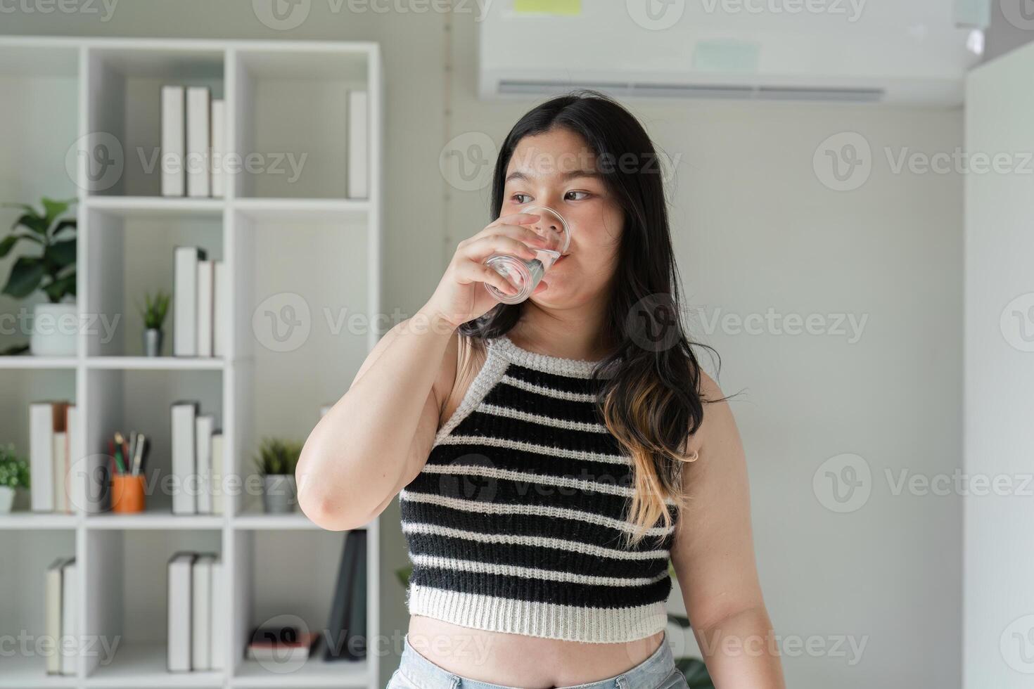 Confident Young Woman Enjoying Healthy Meal at Home for a Balanced Lifestyle and Wellbeing photo