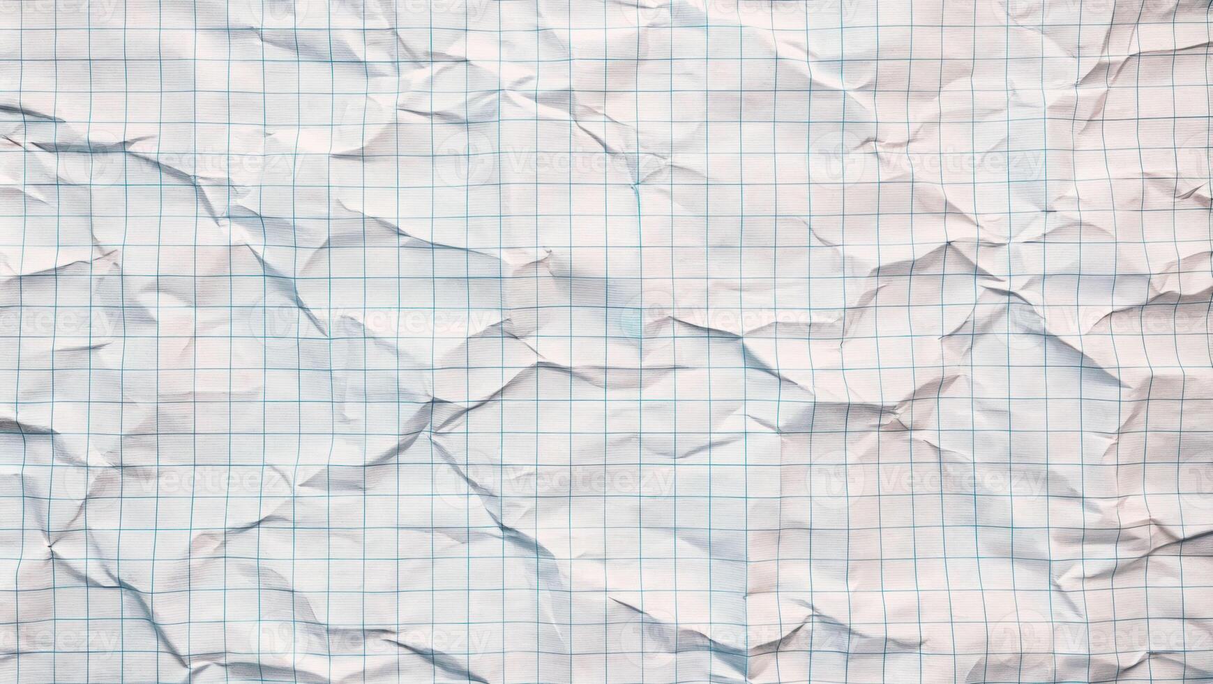 Crumpled grid paper with blue lines, textured abstract background, creative design for school, stationery, or craft projects, retro and minimalist aesthetic photo