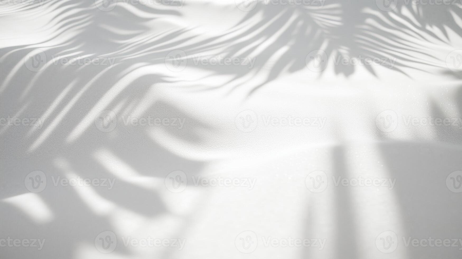 Soft palm leaf shadows on white sand textured surface, minimal nature background with sunlight, abstract tropical design for wellness, beauty, and branding concepts photo