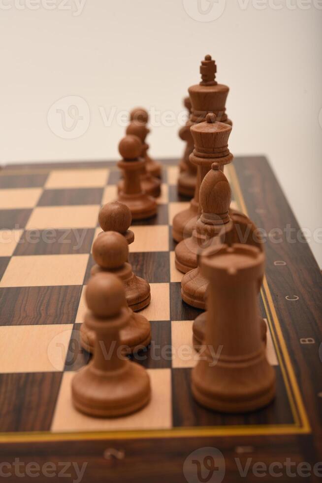 Black and white chess. Wooden chess on a board. A chess game. photo