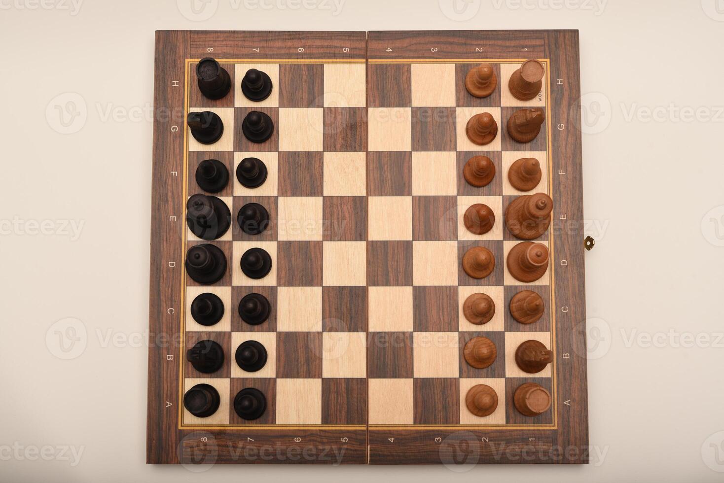 Black and white chess. Wooden chess on a board. A chess game. photo