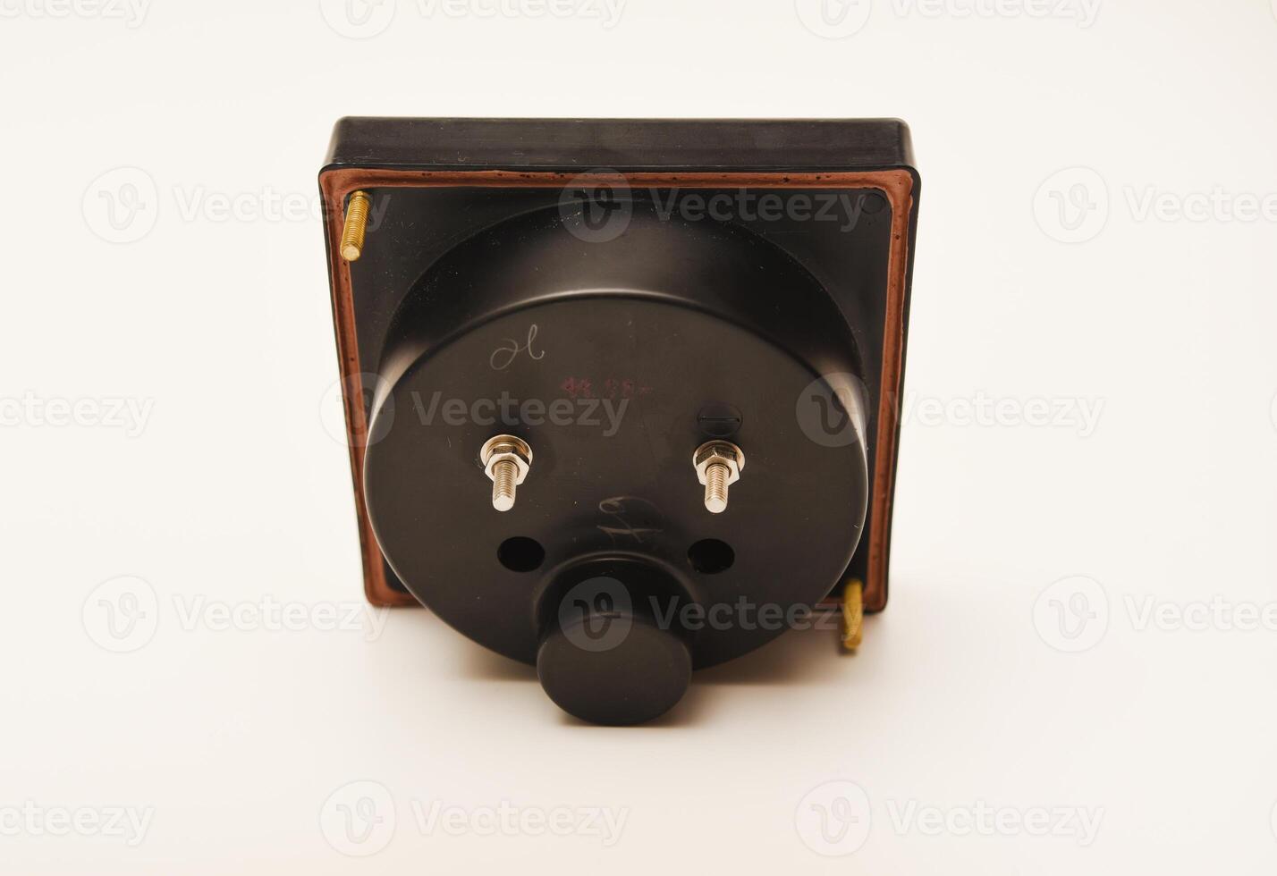Measuring device. An old voltmeter. Arrow voltage meter. photo