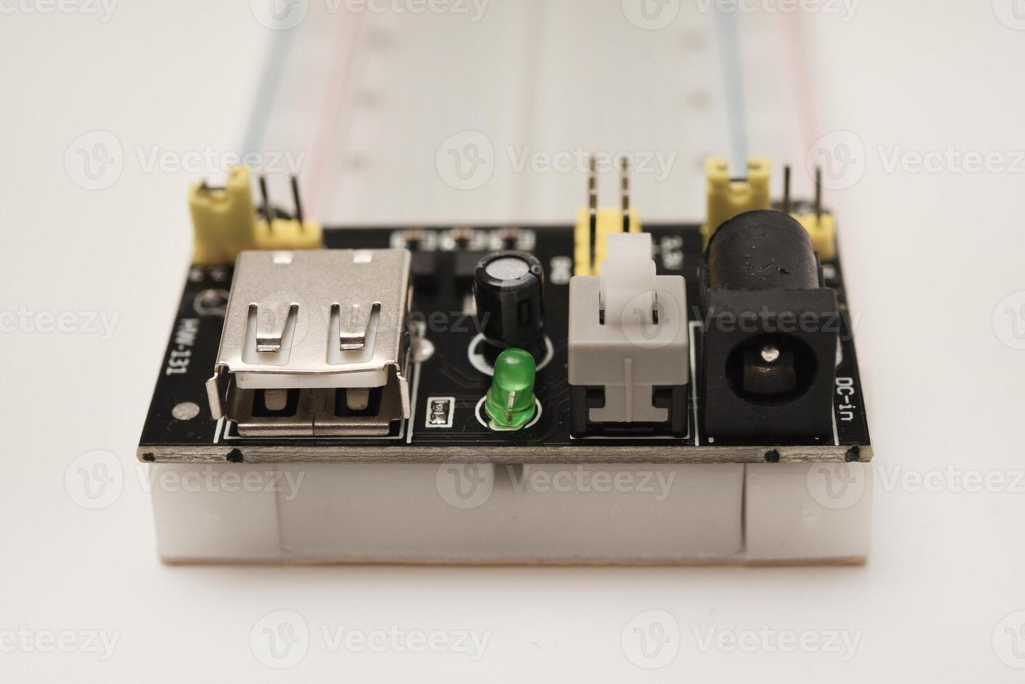 A solderless breadboard for electronics. An assembly tool for radio amateurs. photo