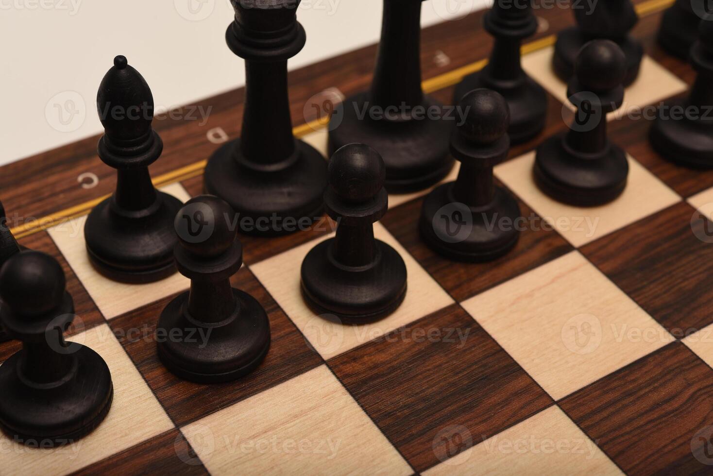 Black and white chess. Wooden chess on a board. A chess game. photo