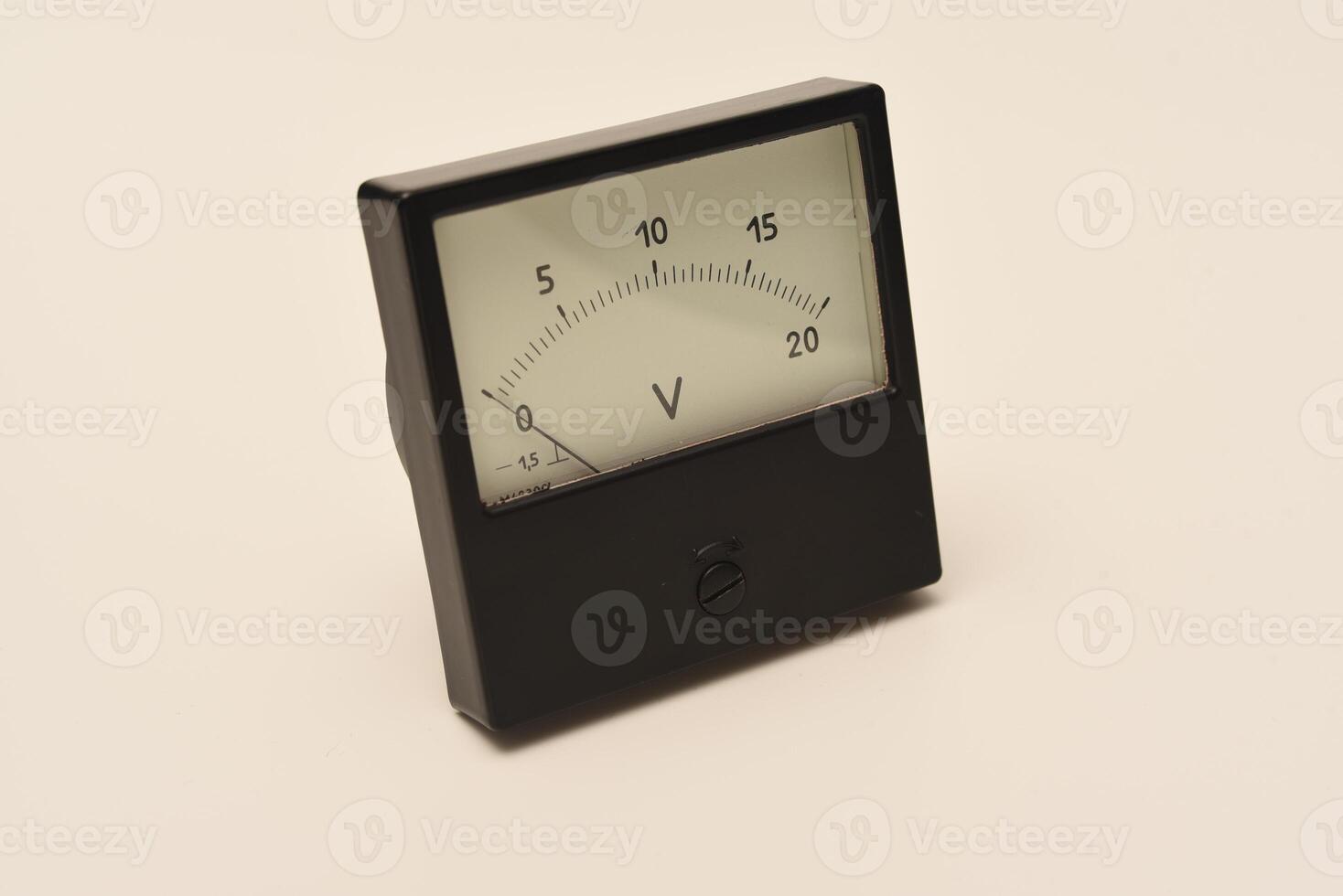 Measuring device. An old voltmeter. Arrow voltage meter. photo