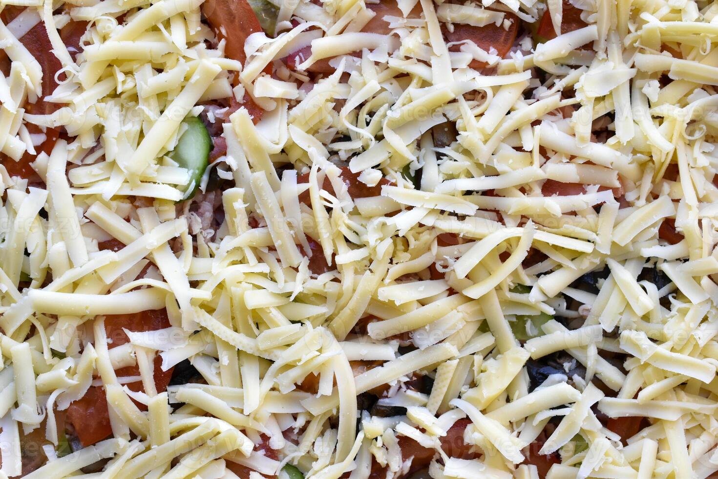 Cooking meat pizza. Pizza toppings before frying. photo