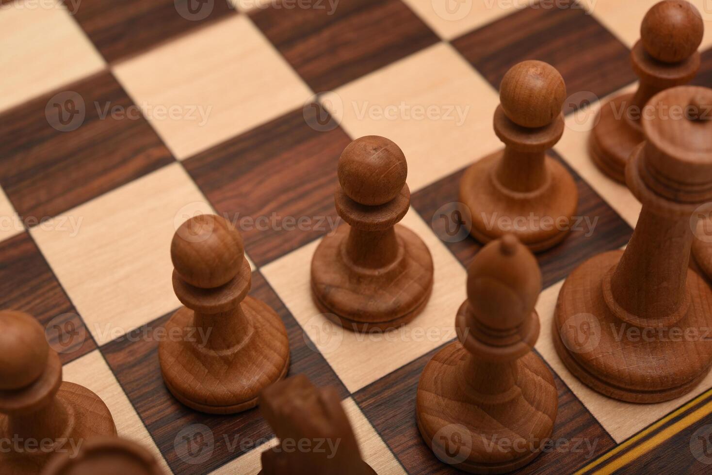 Black and white chess. Wooden chess on a board. A chess game. photo