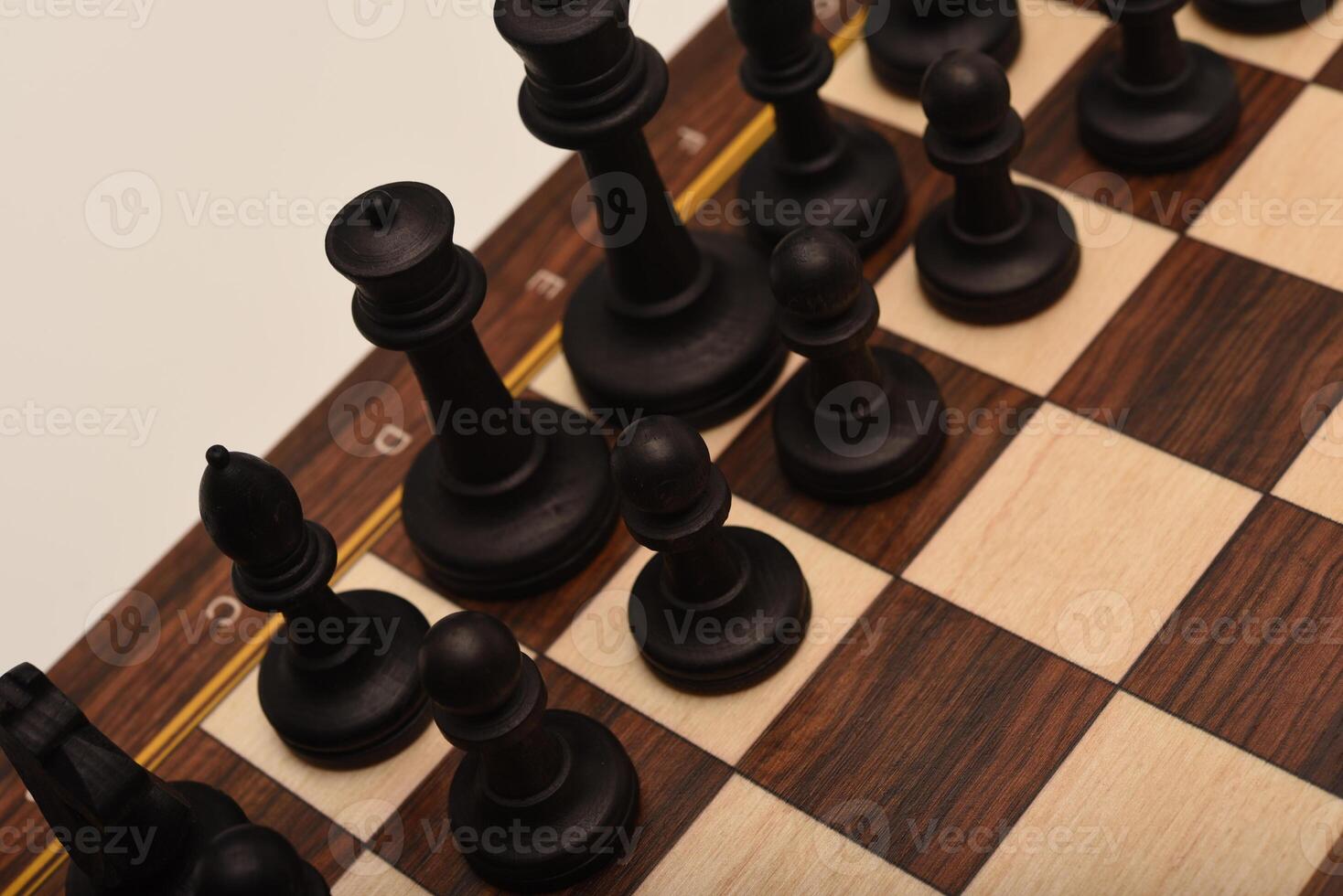 Black and white chess. Wooden chess on a board. A chess game. photo