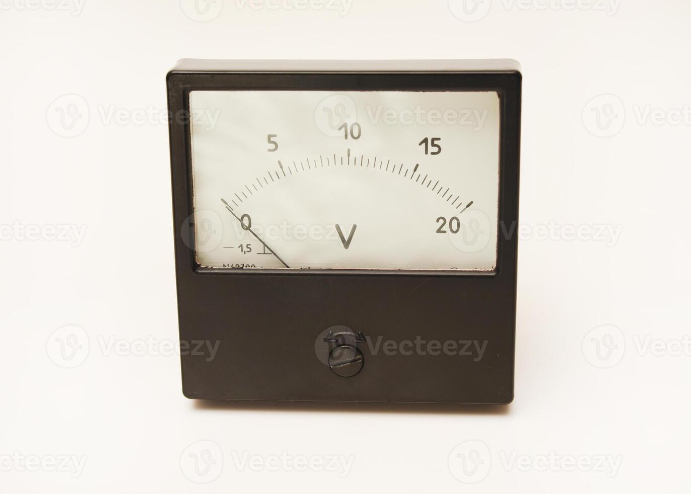 Measuring device. An old voltmeter. Arrow voltage meter. photo