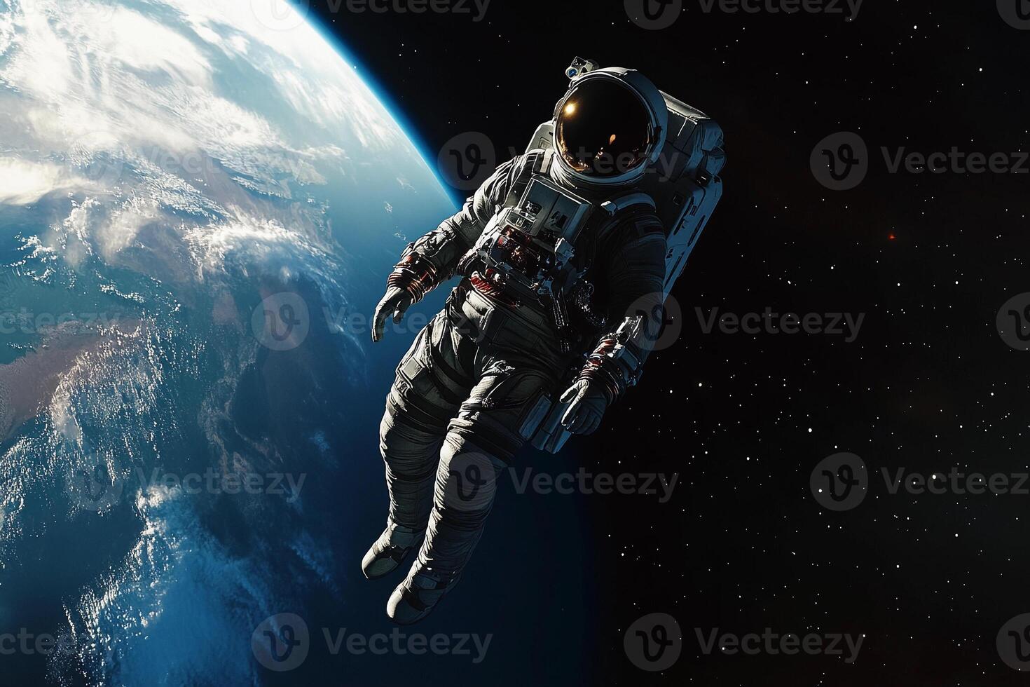 An astronaut floating in space above the earth photo