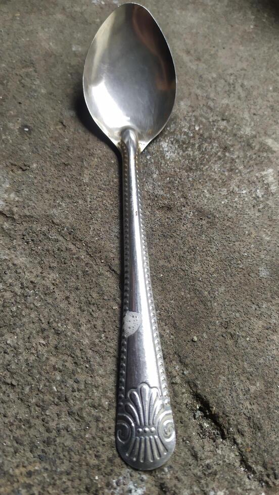 spoon on stone photo