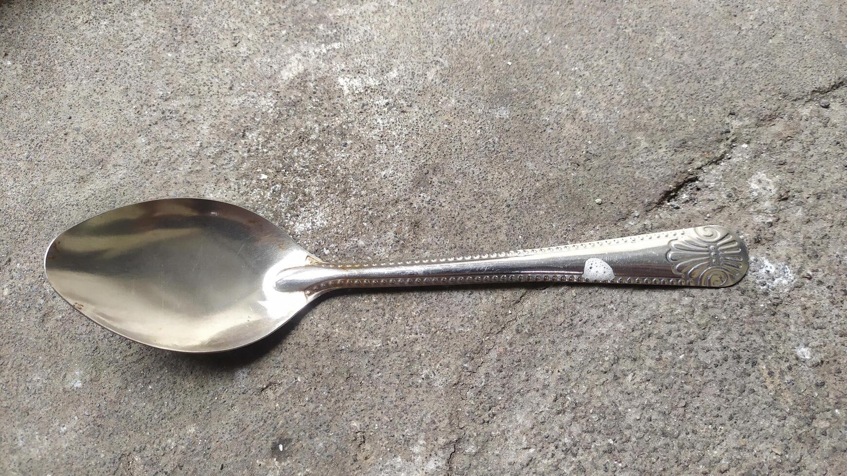 spoon on stone photo