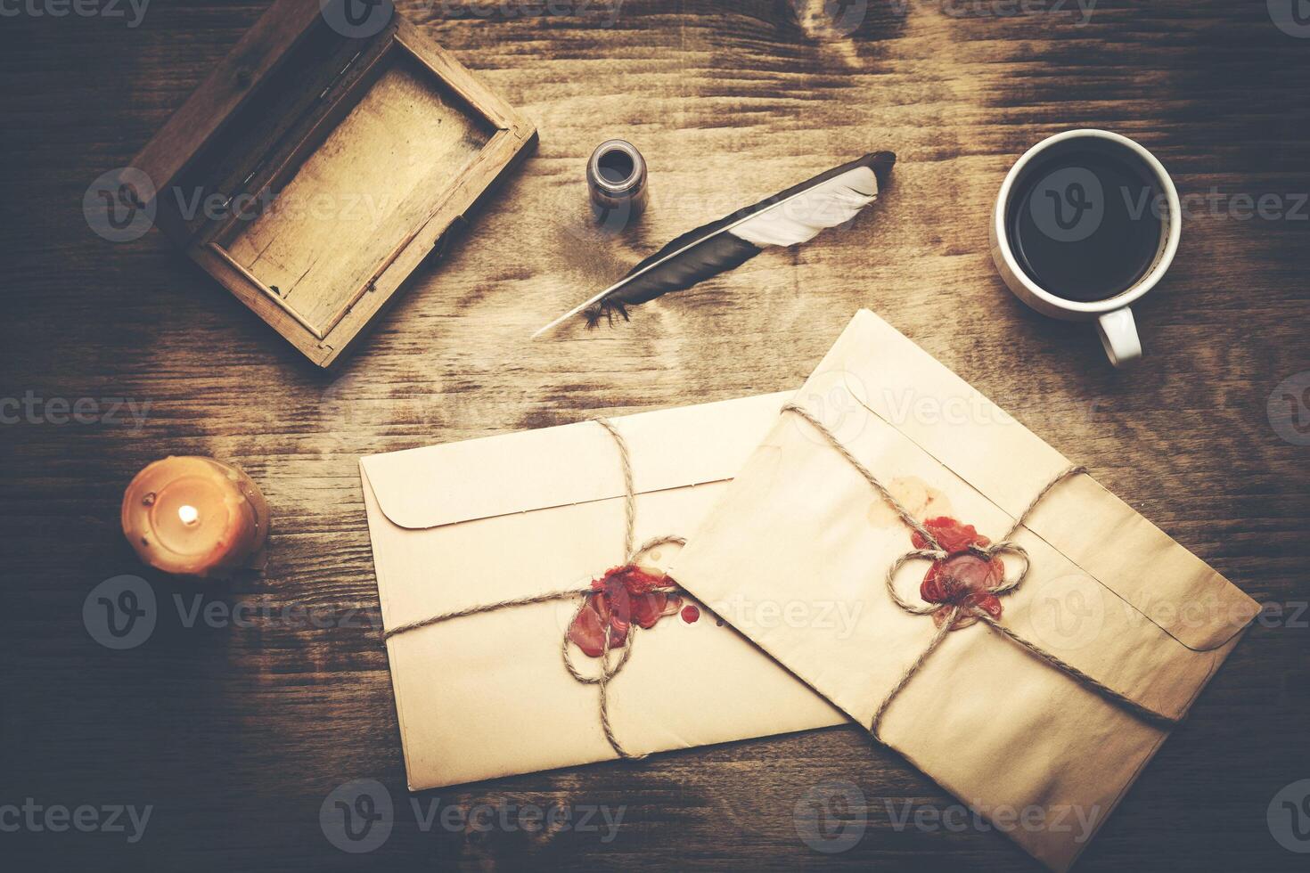 letters and ink on table photo