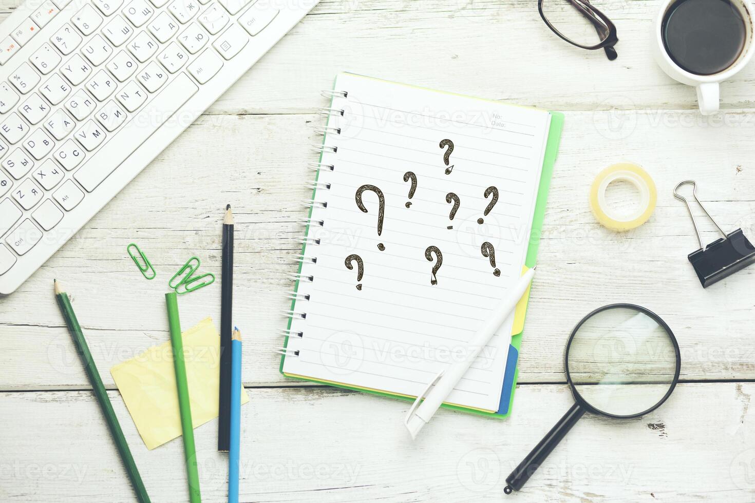 question mark on notepad photo