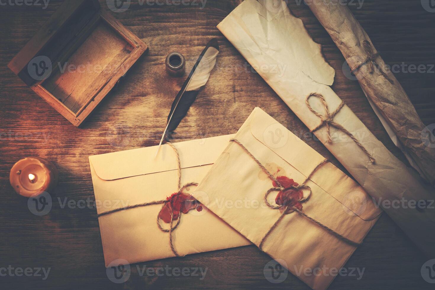 letters and ink on table photo