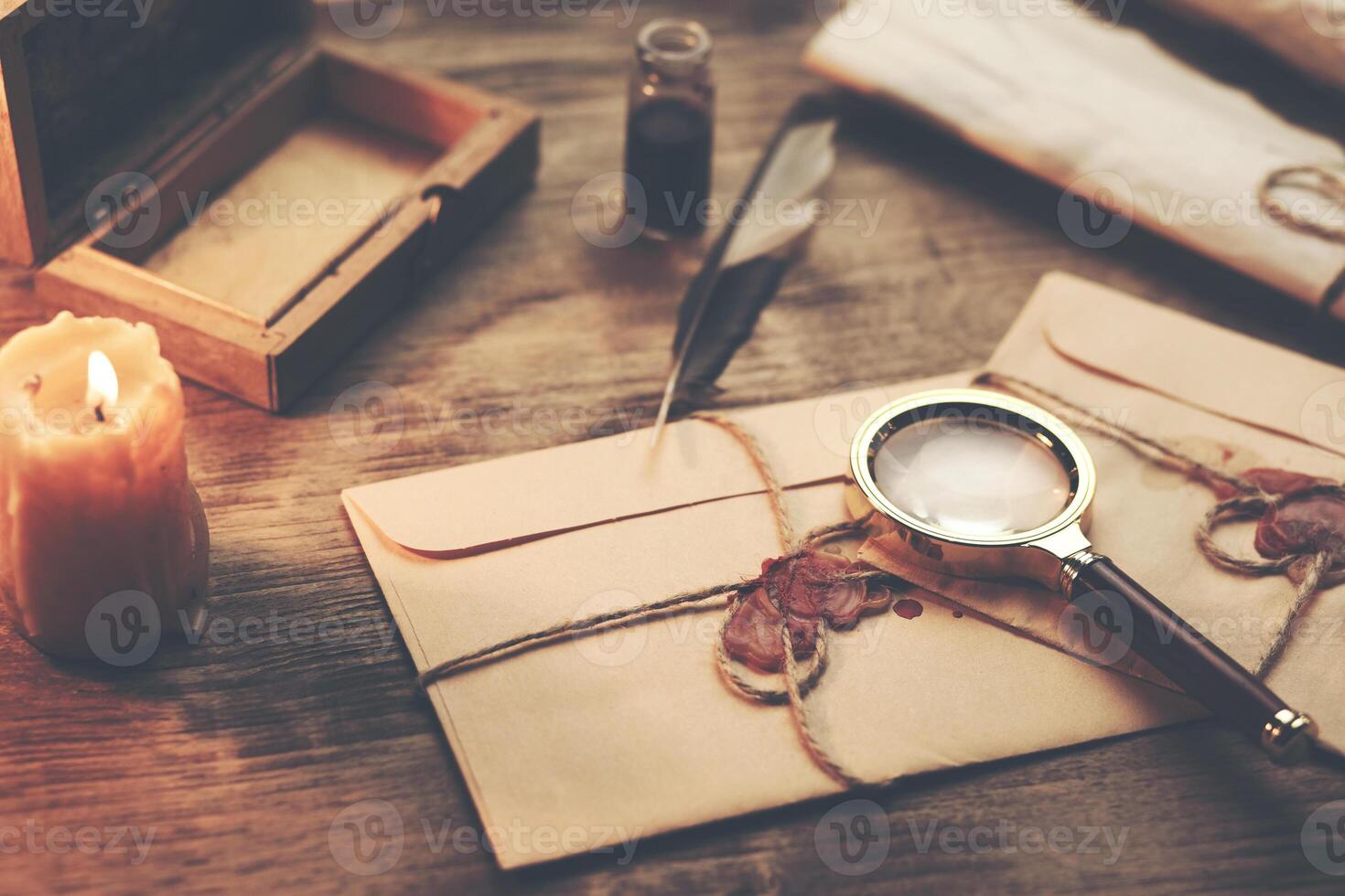 letters and ink on table photo
