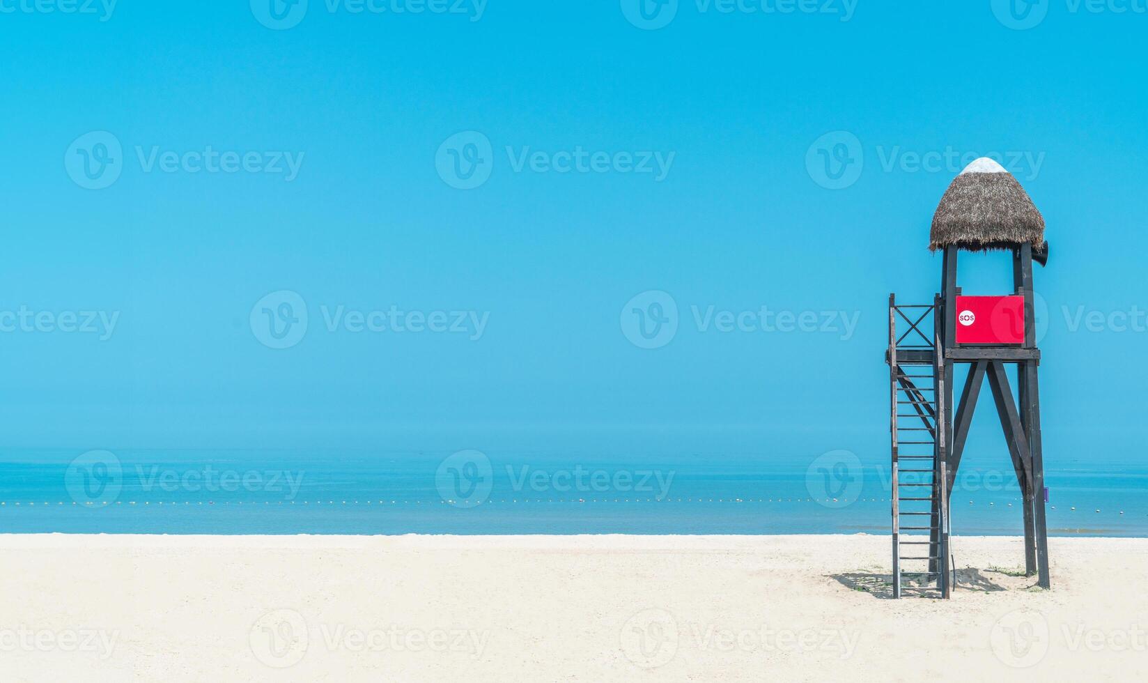 Lifeguard tower on beach, palm roof,china photo
