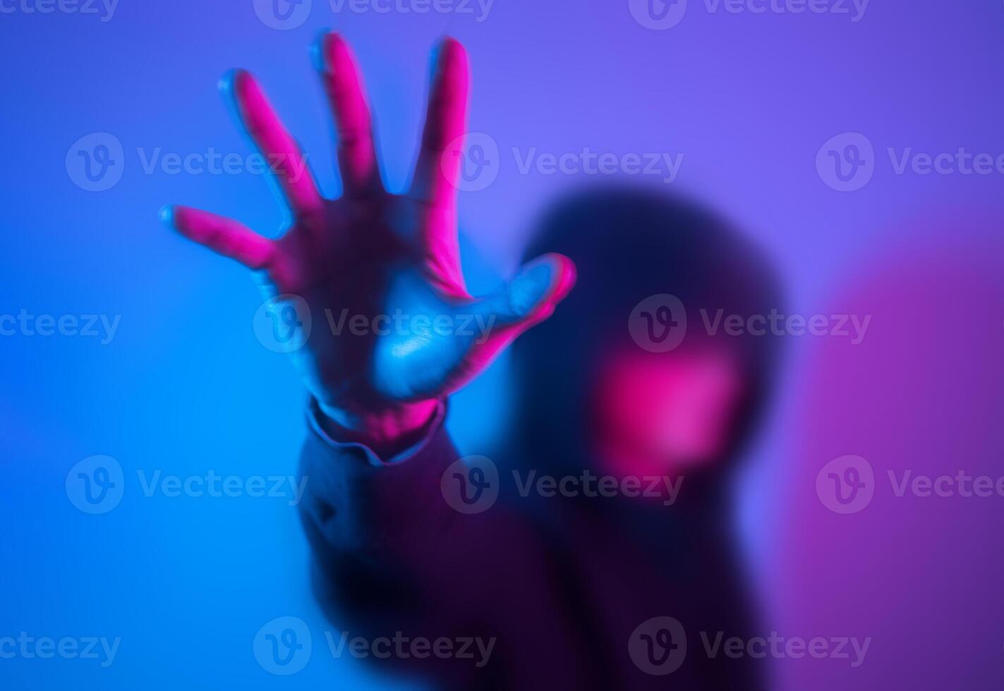 Hacker is woking, touching the screen. photo