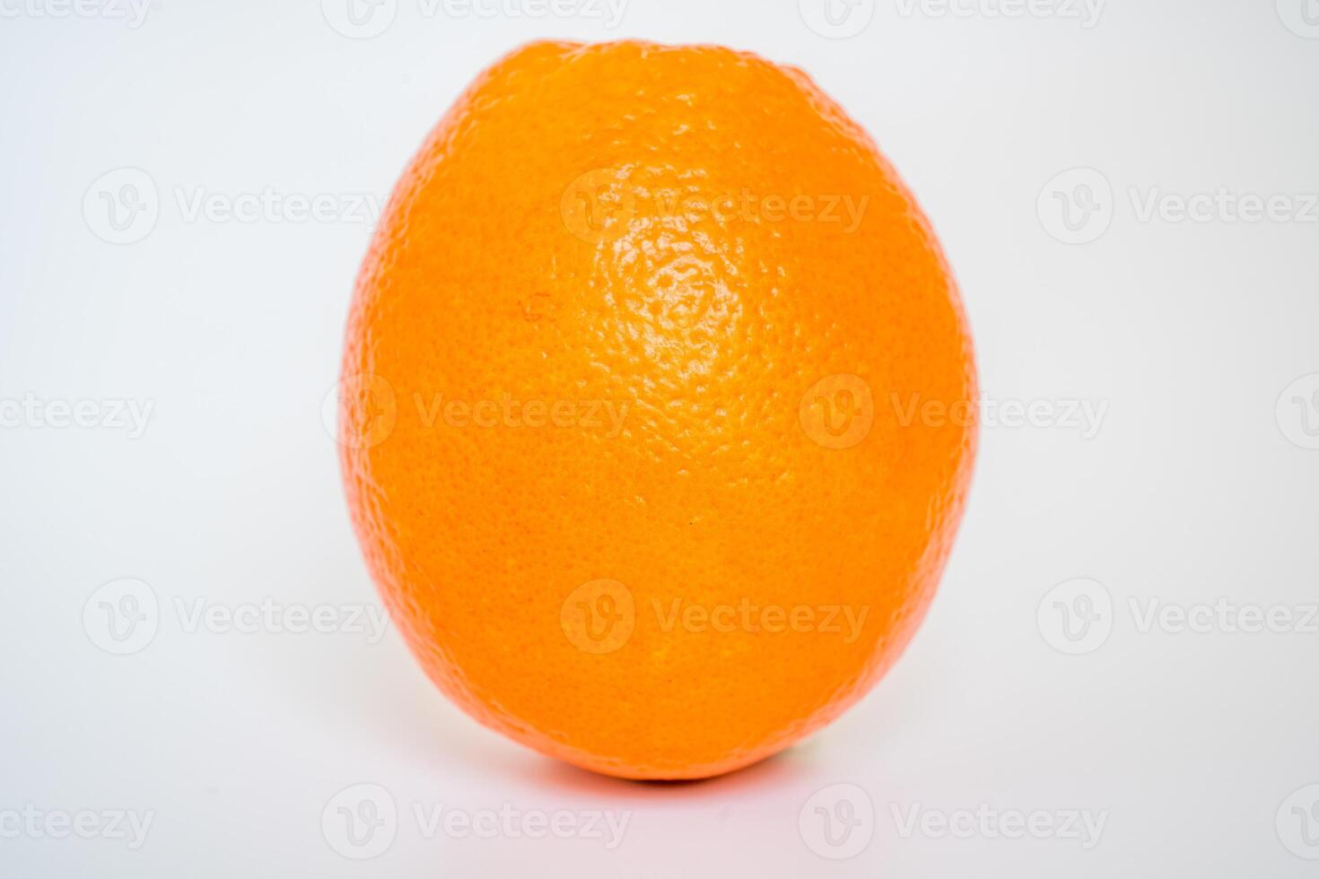orange standing on the table photo