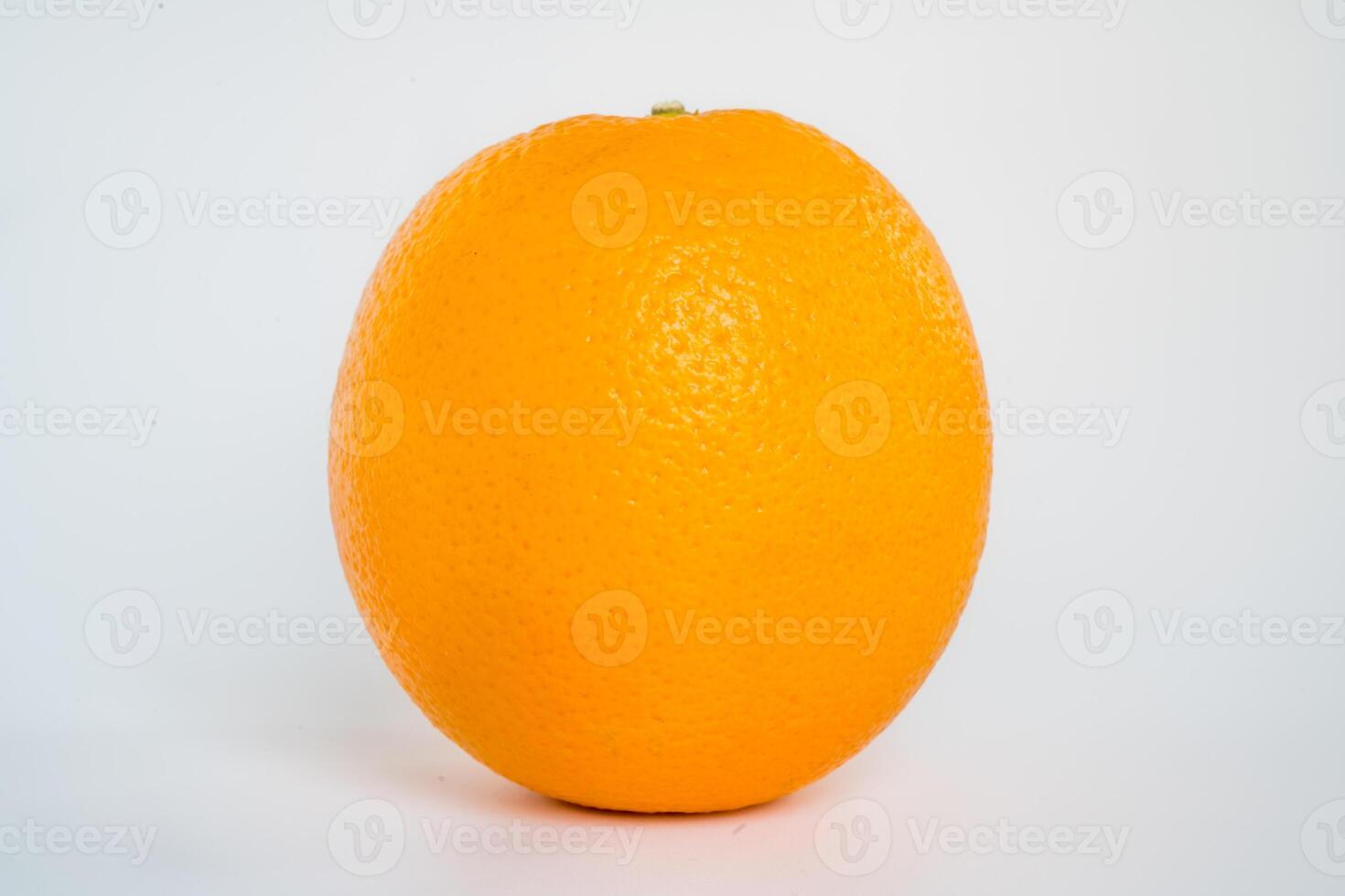 orange standing on the table photo