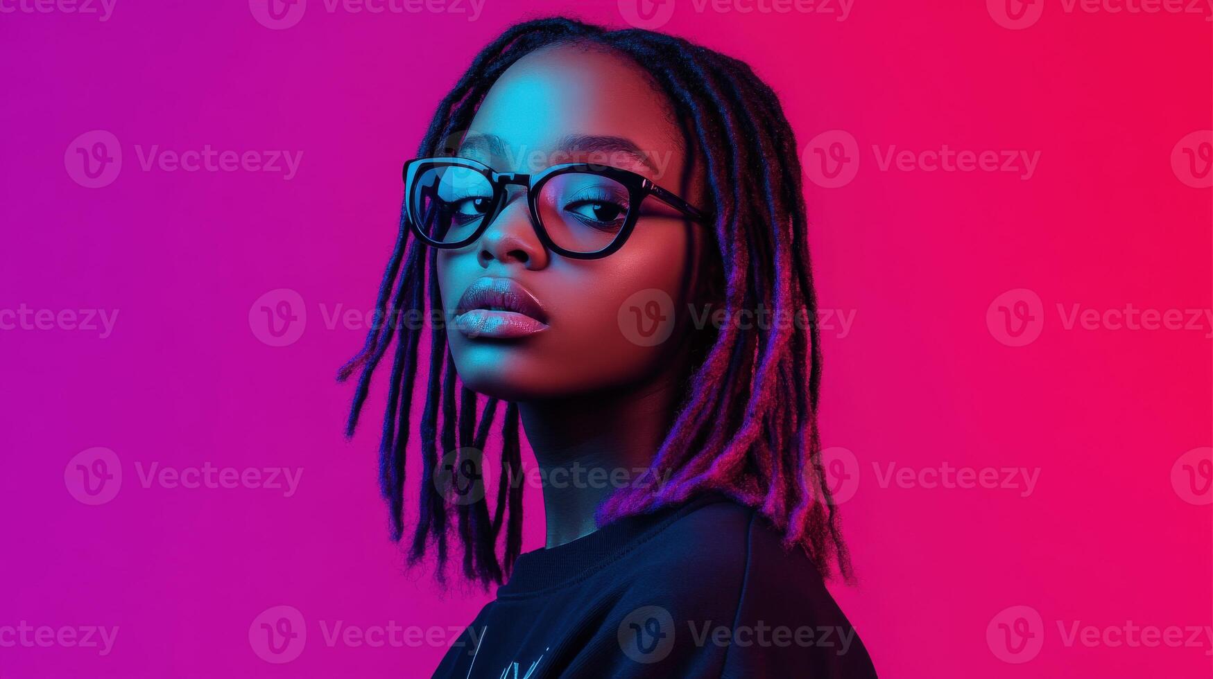 Young girl with glasses and vibrant hair in a colorful setting photo