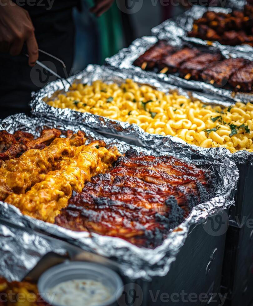 Delicious barbecue and macaroni served at outdoor food festival in city photo