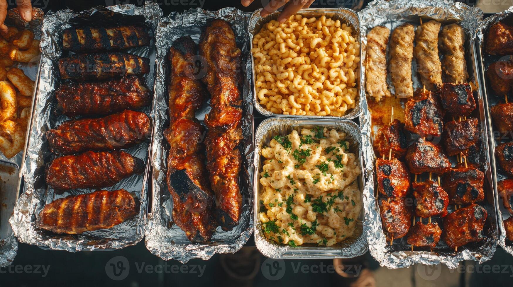 Grilled meats and sides served at a vibrant outdoor gathering in summer photo