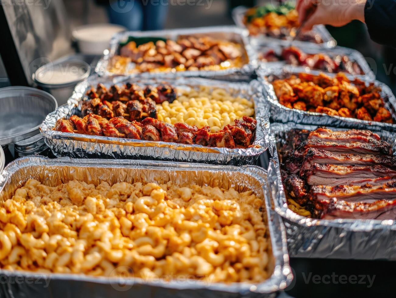 Delicious array of barbecue dishes at outdoor food event in autumn photo