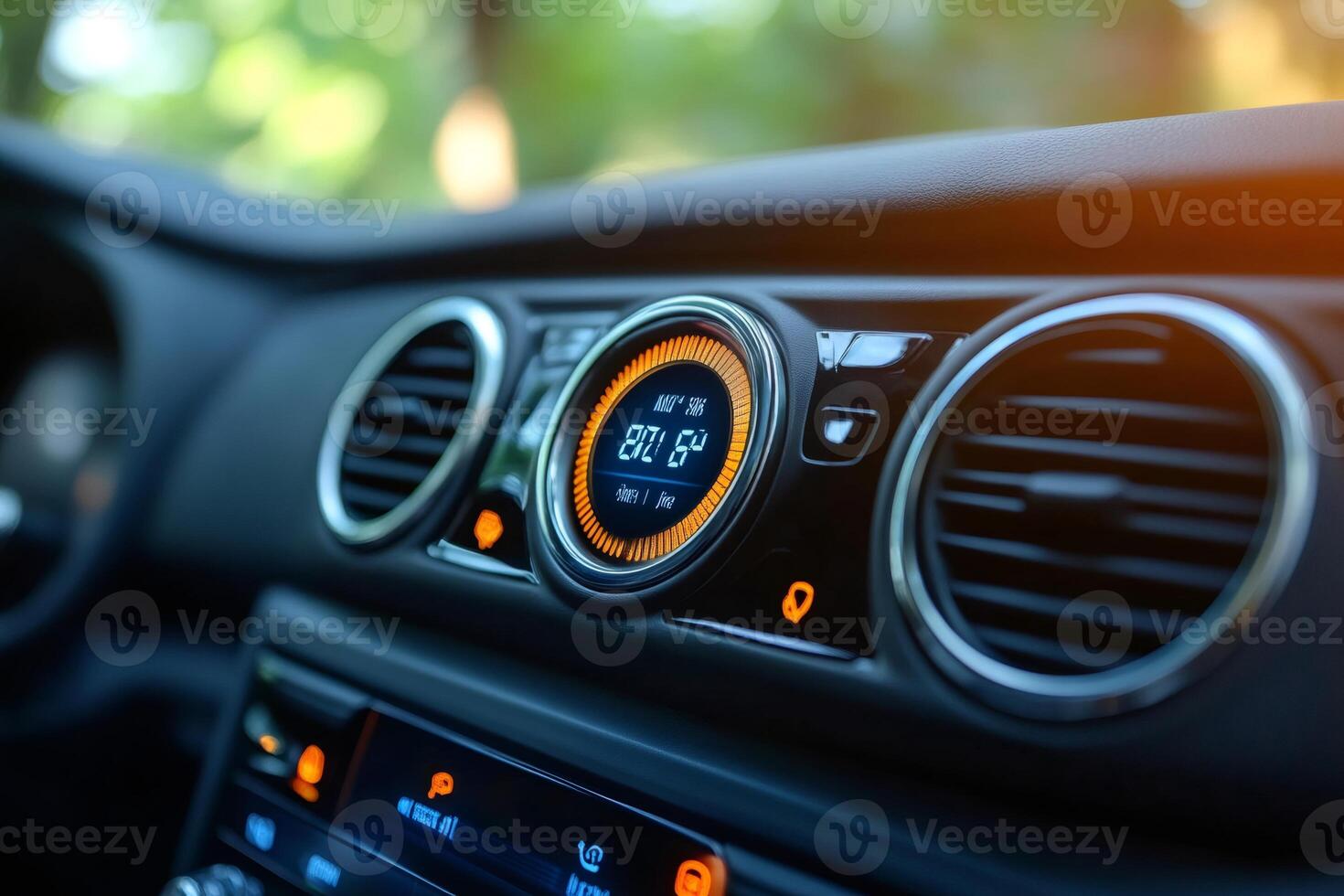 Modern car dashboard displaying air conditioning and temperature information photo