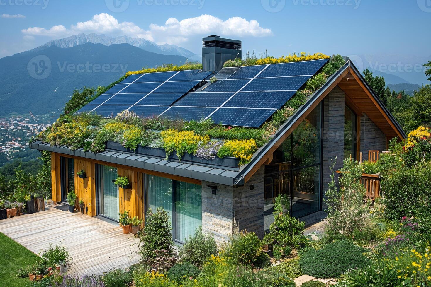 Modern eco-friendly house with solar panels and green roof in mountain landscape photo