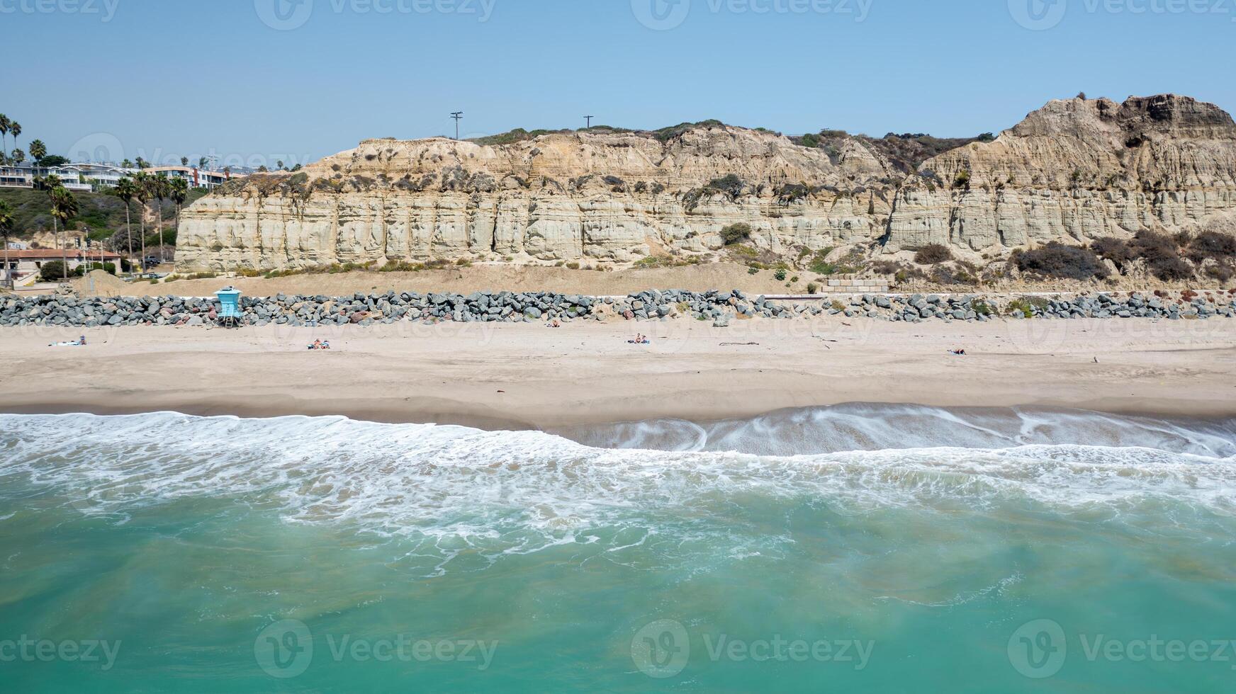 Aerial view of San Clemente coastline showcasing its beautiful beaches and cliffs on a clear sunny day photo
