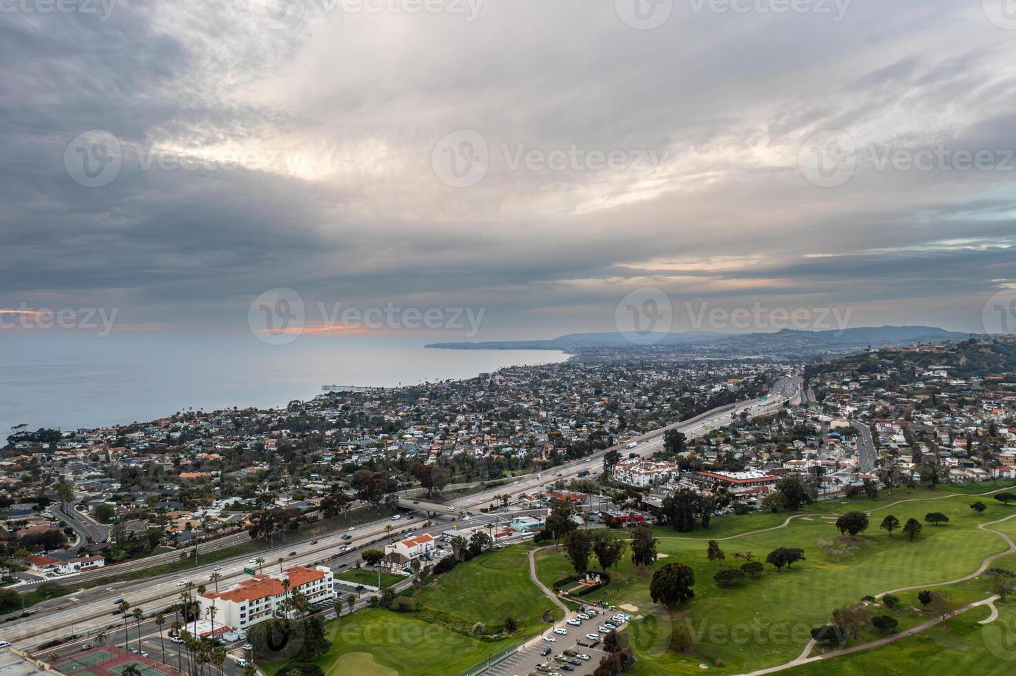 Panoramic aerial view of San Clemente coastline showcasing the blend of ocean and urban landscape during twilight hours photo