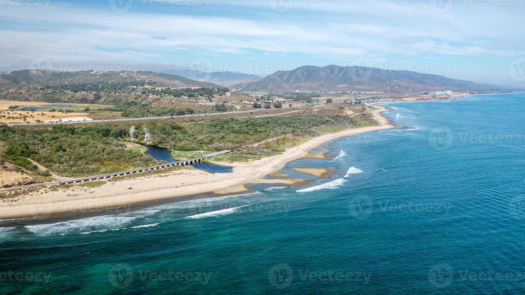 Aerial view of Trestles in San Clemente, California with clear waters and sandy beaches photo