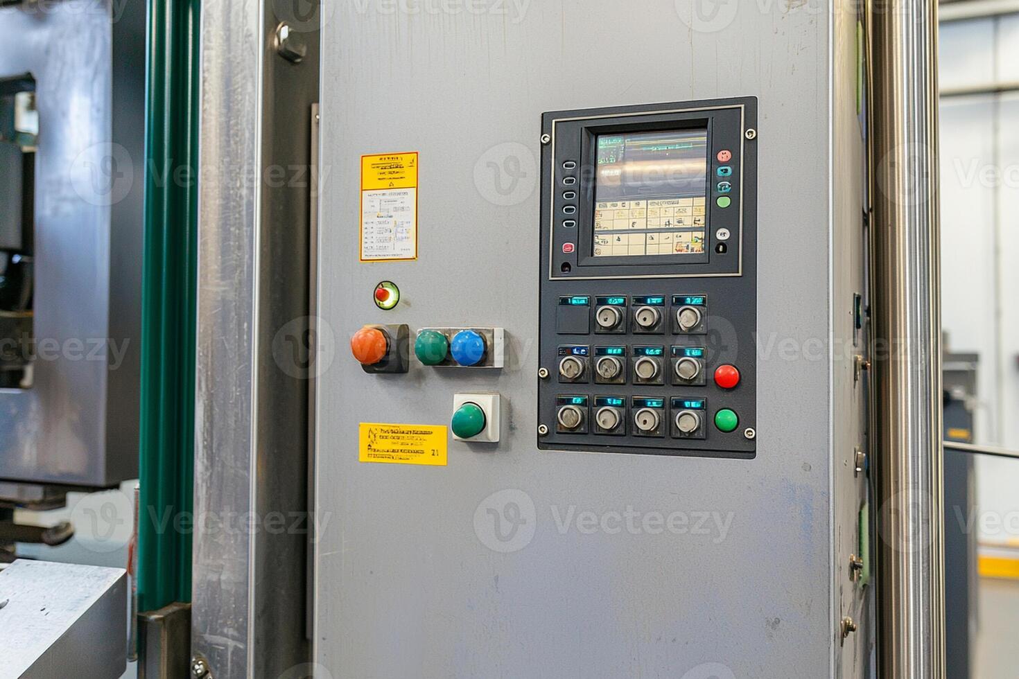 A machine with a control panel and a machine photo