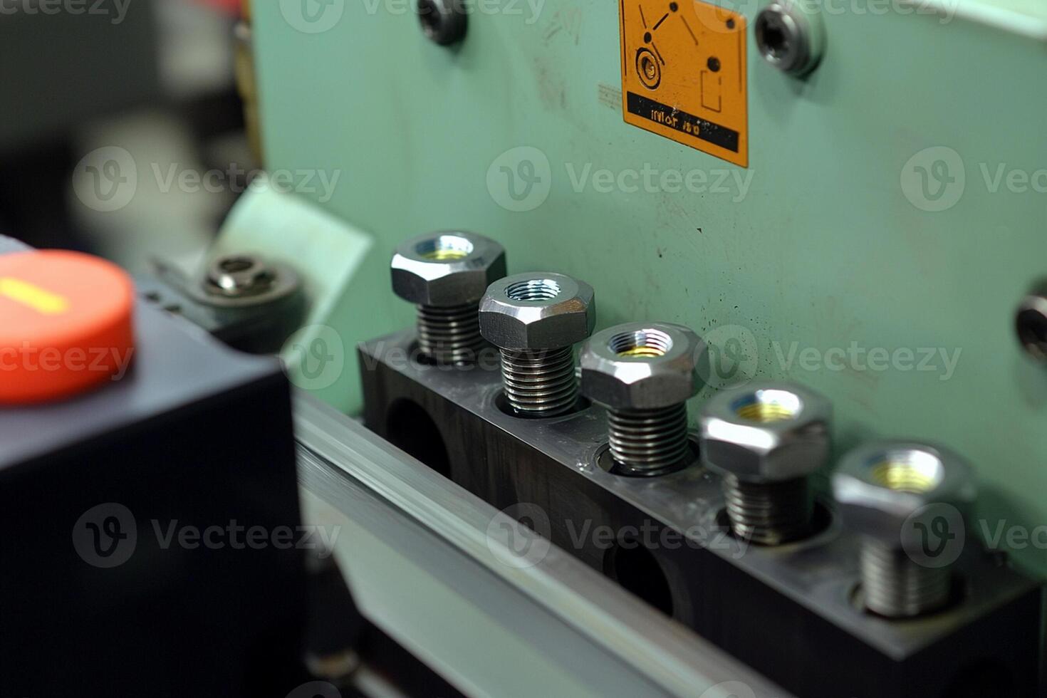 A close up of a machine with nuts and bolts photo
