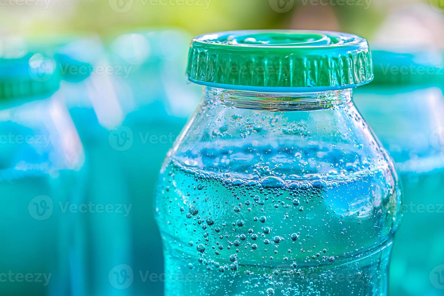 A close up of several bottles of soda photo