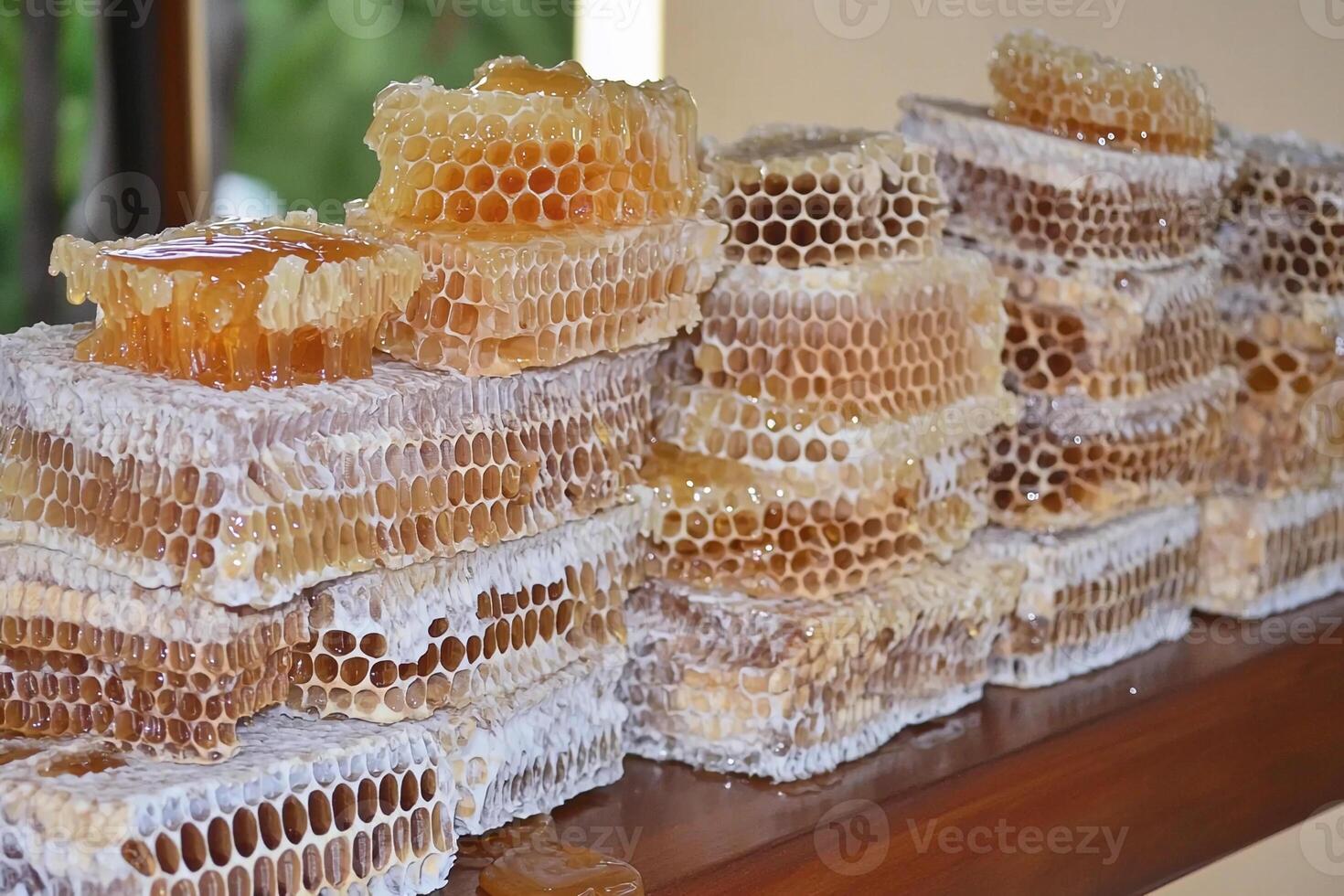 Honeycomb is stacked on a table photo