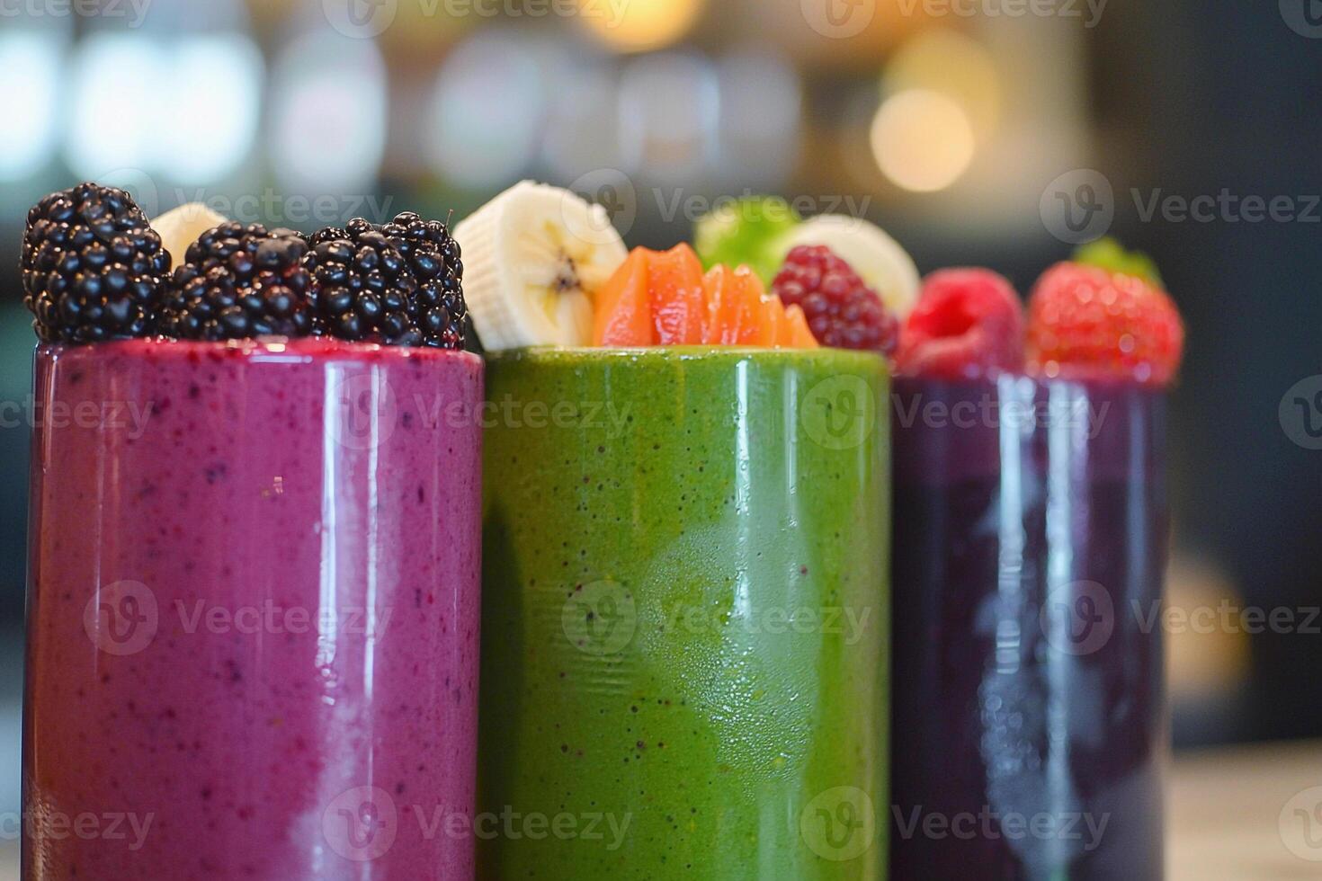 A row of colorful smoothies photo
