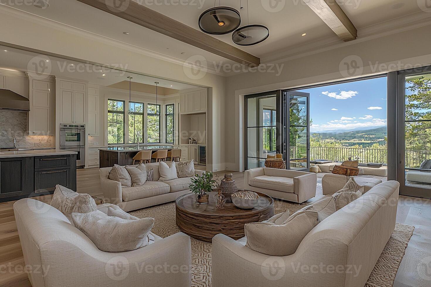 A large living room with a view of the mountains photo
