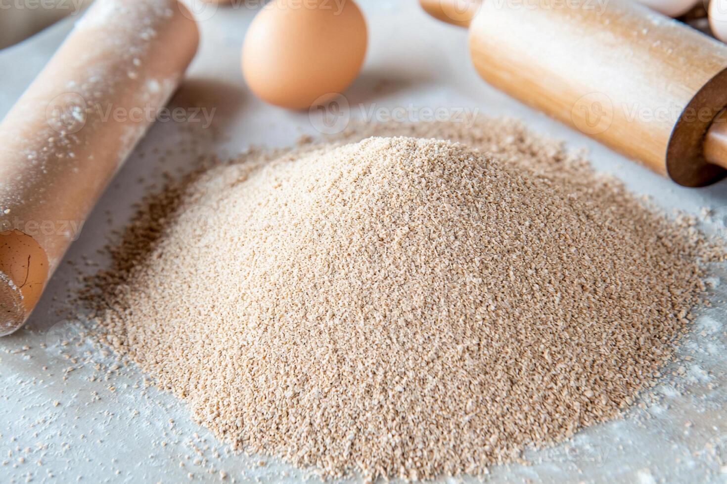 A pile of flour and eggs on a table photo