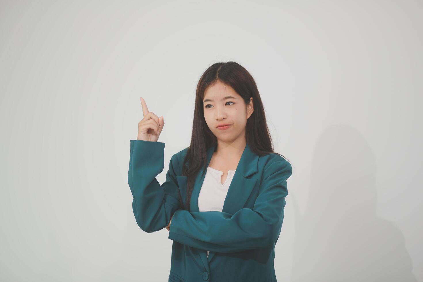Business, finance and employment, female successful entrepreneurs concept. Friendly smiling office manager greeting new coworker. Businesswoman welcome clients with hand wave, hold laptop photo