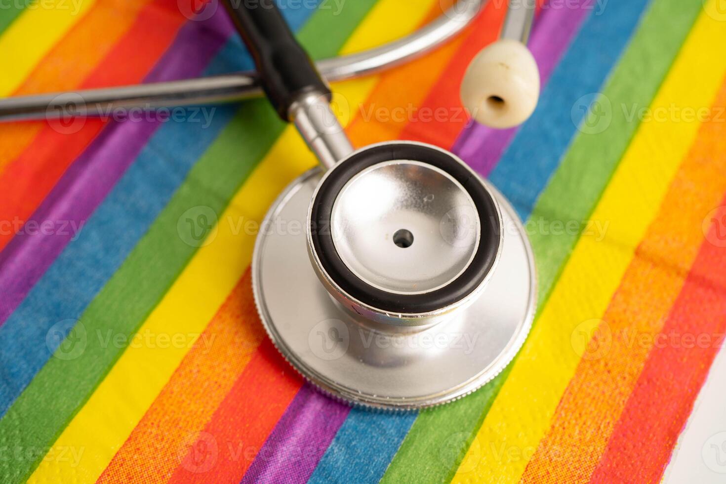 LGBT symbol, Stethoscope on rainbow flag, rights and gender equality, LGBT Pride Month in June. photo